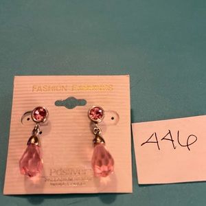 Pink earrings.